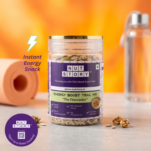 Jar of Nut Story energy boost trail mix with a blurred background
