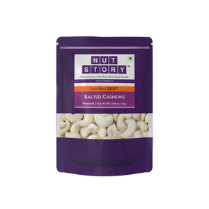Close-up of Nut Story Zest Salted Cashews showing whole W240 kernels with bonded light salt seasoning